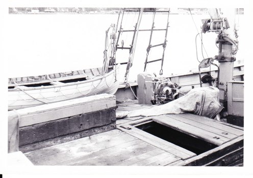Photograph, black and white, shrouds and lifeboat on deck