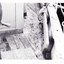 Black and white photograph of the condition of the deck near the ship's wheel