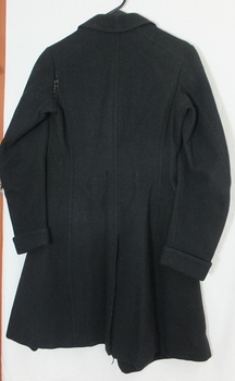 Back of jacket has centre split pleat