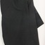 Skirt closure is on the side and is fastened with buttons