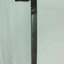 Long metal tool with adjustable sliding attachment