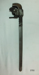 Long metal tool with adjustable sliding attachment