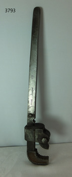 Marks are stamped along the edge of the handle
