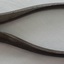 Metal pliers with curved handles and blunt tip