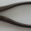 Metal pliers with curved handles and blunt tip