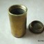 Top of base and bottom of lid have screw threads pressed in the metal surface
