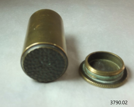 Base had as dimpled surface and edge of lid has a twisted rope disign