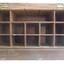 Cabinet of wood currently has 13 pigeon-hole compartments