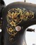 Decal is gold on black and had the image of a dove within it