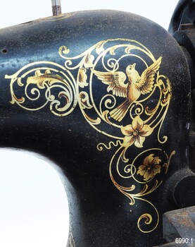 Front decal matches rear decal, with image of a bird and flowers