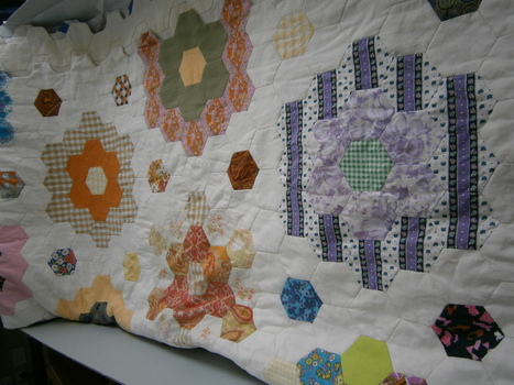 The pattern is made from hundreds of coloured six-sided shapes