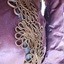 Fancy gold braid decorates the jacket