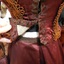 Front of burgundy skirt showing waistband and soft pleat