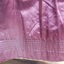 Hem of skirt has rows of stitching through to lining, giving it weight