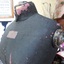 Mannequin is covered in dark coloured fabric