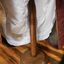Wooden pedestal with round wooden base and rounded turned pole