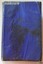 Royal blue plain hardcover front cover. No inscriptions. Remnants of adhesive on parts of the cover