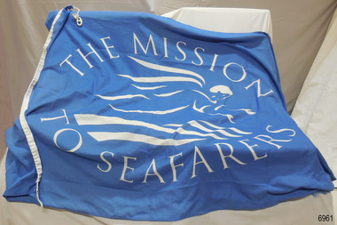Flag with white text and logo is printed on blue background