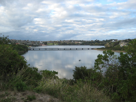 Looking north from the river mouth towards the bridge and Tower Square water tower