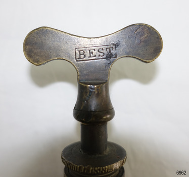 Flat handle has rectangular stamp with impressed letters BEST of maker's brand