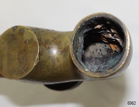 Inlet of pipe is rough inside and has encrustations