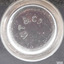 Inscriptions on base of glass