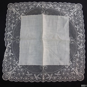 Fine linen square with handmade lace border