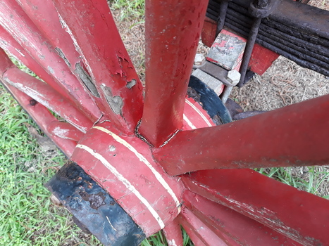 Decorative white stripes on the red painted hub