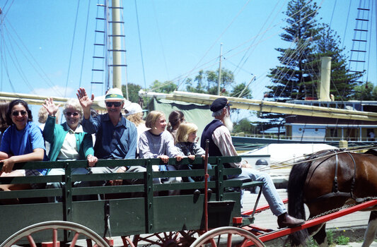 Green and red horse drawn wagon with passengers at Flagstaff Hill, 1997, Jani and Brian on the ride