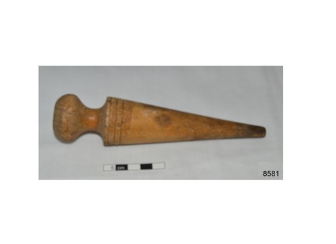 Blonde wood cone shaped tool with round handle