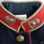 Collar badges depict an exploding grenade with a field cannon and text AUSTRALIA