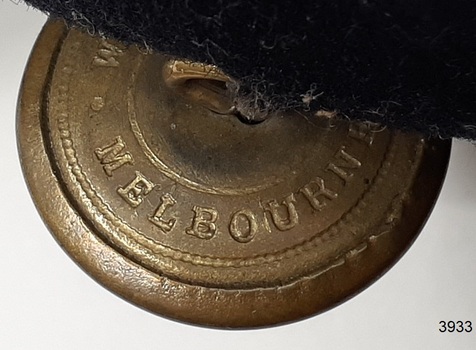 Impressed into back of button is location of maker, Melbourne