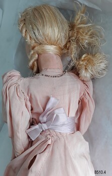 Detailed view of the back (hair and torso) of the Boudoir Doll