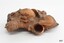 Conglomerated sand and soil, containing portions of clay tobacco pipes