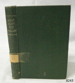 Green cloth hardcover book with a label and  gold embossed print  on the spine