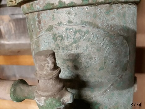 Maker's oval plate on the boiler behind a tap fitting