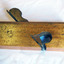 Wooden plane is very narrow and has inscription with owner's name