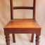 The front legs of this wooden chair are turned.