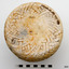 Base of vase has remnants of stamped text