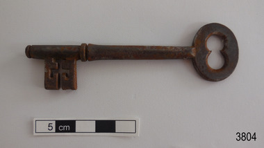 Heavy iron latch key with oval handle
