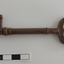 Other side of iron latch key with oval handle