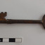 Other side of iron latch key with oval handle