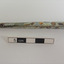Nail has encrustations on surface