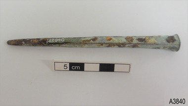 Nail has encrustations on surface