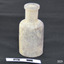 Upright bottle has wide mouth and narrow shoulders