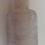 Glass has marks showing the stages of the blown glass