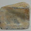 Base of bottle is indented and creased