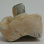 Side profile showing buckled base of bottle