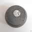 Maker's details are stamped on the base. A white sticker is on the base.