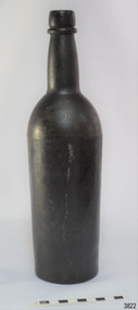 Black glass, cylindrical, bulbous neck. A narrow white line is down one side.